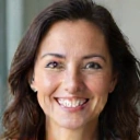 Portrait of a smiling woman named Sarah M.